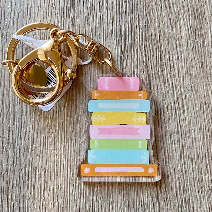 Book Stack Acrylic Keychain - Lyla's: Clothing & Gifts - Online and Rockwall Texas Boutique