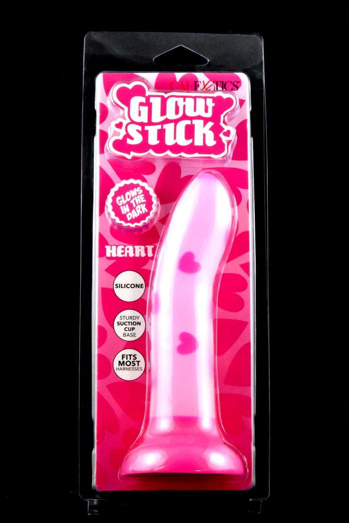 Glow Stick silicone dildo with heart graphics in pink retail box, harness-compatible suction base and gentle curve shown.
