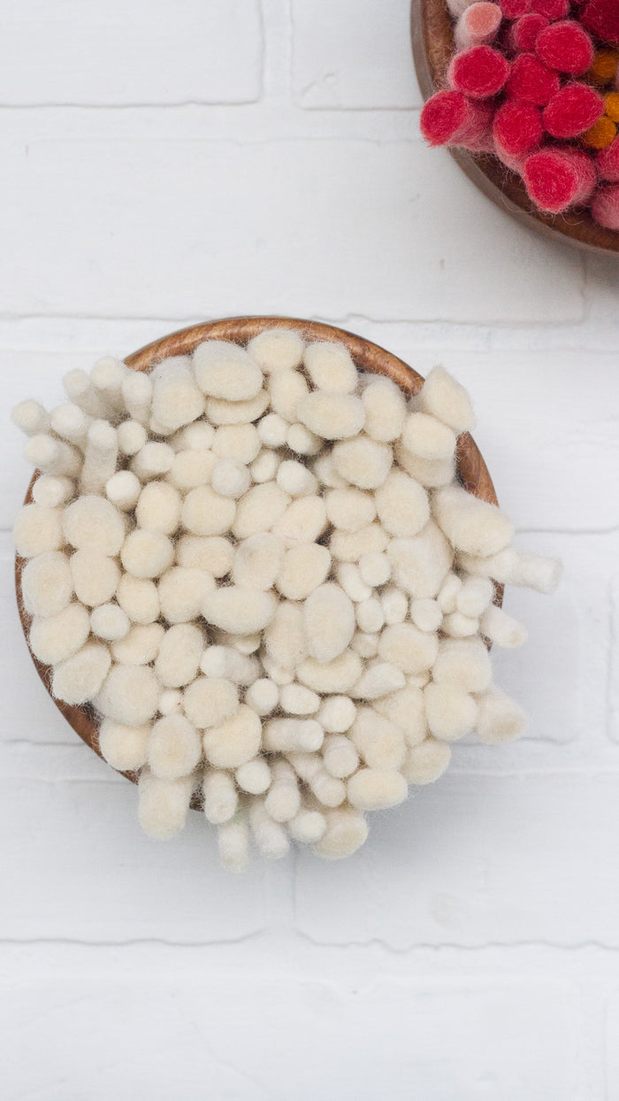 The Puff Collection | Round Teak Frame Felted Fiber Art in All White