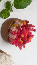 The Puff Collection | Round Teak Frame with Fiber Art in Felted Guava and Red