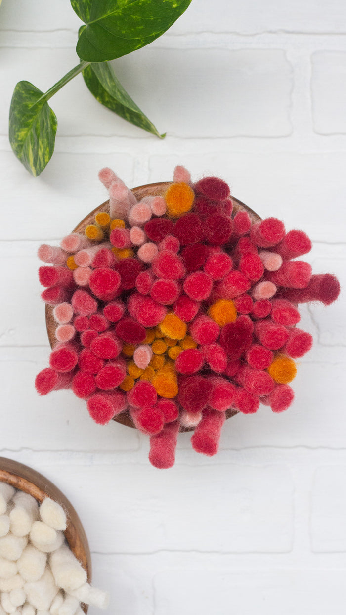 The Puff Collection | Round Teak Frame with Fiber Art in Felted Guava and Red