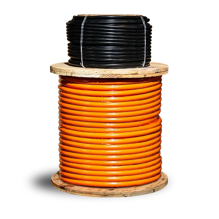 UNIMIG MEGAFLEX welding cable shown as orange cable on a wooden reel with a black coil above